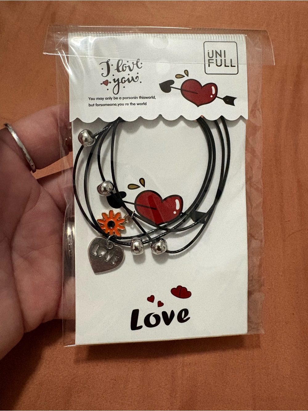 UNIF Black Multi-Strand Necklace with Red Heart and Orange Flower Charms